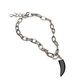 Brutalist necklace with gemstone tooth, edgy agate pendant hangs from chunky steel chain with u bolt shackle