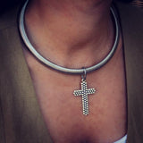 Bold yet minimal stainless steel bar choker with textured cross pendent, a statement piece