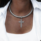 Bold yet minimal stainless steel bar choker with textured cross pendent, a statement piece