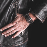 Men’s leather and metal bracelet combined for a strong look