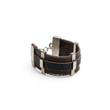 Men’s leather and metal bracelet combined for a strong look