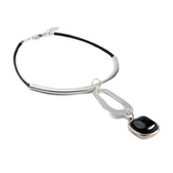 Chunky black resin necklace bracelet and ring, dramatic leather and metal set