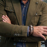 Men’s bracelet with flat silver chain on tan leather