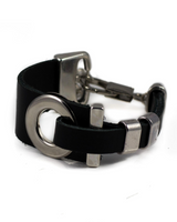 Chunky black leather bracelet featuring silver-plated accents, adjustable length, and a rock style design.