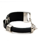 Chunky black leather bracelet with silver-plated designs, featuring an adjustable extension chain for a perfect fit.