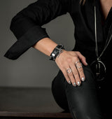 Edgy wrap-around black leather bracelet with silver-plated designs