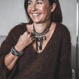 Edgy wrap-around black leather bracelet with silver-plated designs