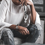 Edgy soft black leather necklace with irregular shaped design and coin pendant, gift for christmas, standout necklace
