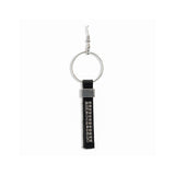 Funky earrings made of black leather with strass and silver-plated elements, different earring on each ear worn together or individually