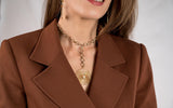 Classy gold-plated brass necklace with metallic motif and baroque pearl
