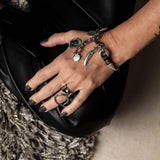 Silver charm bracelet, leather and metal bracelet with coins
