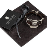 Unisex metal and leather bracelet made in the uno de 50 style