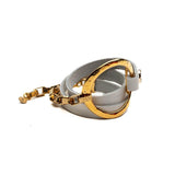 Edgy white leather triple wrap bracelet featuring a hammered gold metal loop and chunky stainless steel chain.