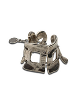 Wide silver-plated zamak arm cuff featuring five unique linked metal pieces, adjustable with an extension chain.