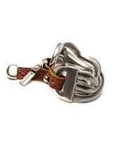 Brown woven leather cuff bracelet featuring layered silver snake chains and an engraved Otherwise logo charm.