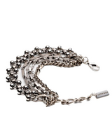 Silver chain with a clasp on a white background