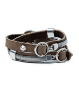 Brown leather bracelet with silver metal elements on a white background