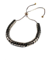 Necklace with black and silver beads on a white background