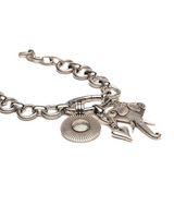 Silver bracelet with charms on a white background