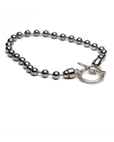 Sterling silver plated ball chain set featuring chunky sphere beads and a large organic ring and bar clasp.
