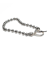 Chunky sterling silver plated ball chain bracelet featuring a large organic ring and bar clasp for secure fastening.