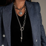 Antique plated steel choker and long necklace set featuring a tiger head pendant, styled in layered chains.