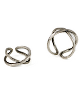 Pair of silver ring earrings on a white background