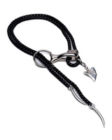 Chunky black and silver chain necklace featuring sculptural tooth pendants and a unique double strand design.