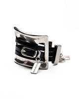 Bold chunky cuff bracelet featuring a sculpted sterling silver link with multiple black leather straps. Unisex design.
