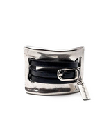 Large metal and leather statement cuff bracelet featuring a chunky silver sculpted link and dark leather straps.