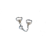 Adjustable double silver rings with chain feature two silver-plated bands connected by a stainless-steel chain with a horse bit.