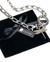 Chunky dragonfly pendant necklace with detailed silver-plated charm on a heavy-duty stainless steel link chain.