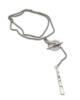 Silver necklace with a unique pendant on a white background