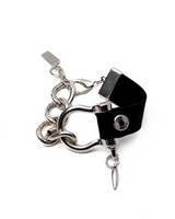 Chunky black leather bracelet featuring a large silver horseshoe shackle, connected by heavy stainless steel chain.