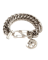 Silver chain bracelet with a heart-shaped charm on a white background