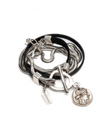 Multistrand bracelet with charms on a white background