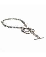 Chunky silver bracelet featuring organic-shaped links and a toggle clasp, showcasing a bold, sculptural design.
