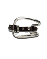 A silver-toned metal ring-style cuff bracelet with a dark brown leather strap and silver buckle, shown on a plain white background.