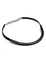 Layered choker set featuring sleek gunmetal tubes and black leather, designed for an edgy, modern look.