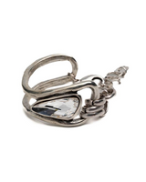 Swarovski crystal bracelet featuring a bold silver-plated design with a large crystal centerpiece.