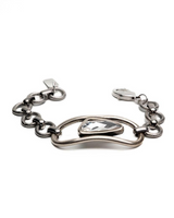 Chunky silver-plated bracelet with a clear Swarovski crystal centerpiece, featuring adjustable links for a tailored fit.