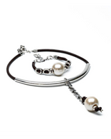 Two pearl bracelets on a white background
