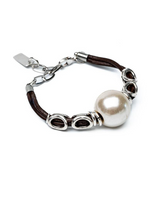 Bracelet with a pearl bead on a white background