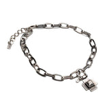 Brutalist chunky steel chain set: textured cross necklace & shackle bracelet
