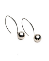 A pair of silver drop earrings with sleek, curved wire hooks and polished spherical beads, displayed on a clean white background.