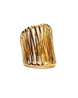 Gold ring with a ribbed design on a white background