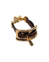 Gold and brown bracelet on a white background