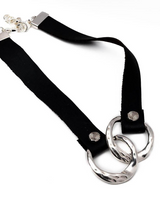 Chunky black leather necklace with hammered sterling silver links, featuring a bold design and adjustable clasp.