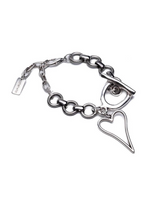 Chunky heart statement bracelet featuring a stainless steel chain with a hammered heart pendant and T-clasp closure.
