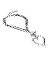 Chunky heart statement set featuring a silver choker with an oversized heart pendant and a toggle clasp.